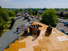Roof Shingles Need With New Shingles Of An Apartment Building Replacing Gray Asphalt Tile