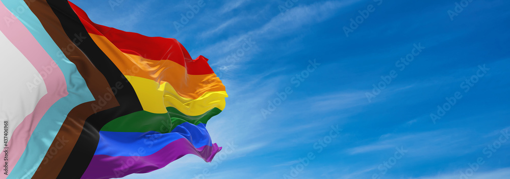 Progress LGBTQ rainbow flag waving in the wind at cloudy sky. Freedom and love concept. Pride month. activism, community and freedom Concept. Copy space. 3d illustration - obrazy, fototapety, plakaty 