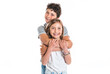 © Louis-Paul Photo - Portrait of cute girl and boy on studio white background