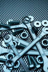 Set of chrome wrenches on steel surface. Mechanic tools for maintenance. Hardware tools to fix