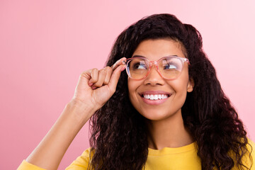 Canvas Print - Photo of young cheerful afro girl happy positive smile hand touch eyeglasses isolated over pastel color background