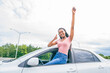 © Louis-Photo - Young black teenage driver seated in her new car