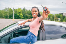 Young Black Teenage Driver Seated In Her New Car