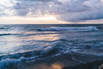 Waving sea during amazing sunset