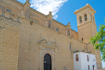 Side view of the facade of the Colegiata Nuestra Señora de la Asuncion In Osuna, Seville, Andalusia, Spain