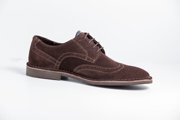 Male brown leather elegant shoe on white background, isolated product, comfortable footwear.