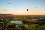 Fototapeta  - Hot air Balloons in Pokolbin wine region over wineries and vineyards, Aerial image, Hunter Valley, NSW, Australia