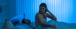 © realstock1 - The sad woman sit near a man in the bed. night time