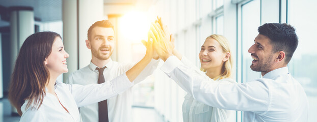 Wall Mural - The happy business people greeting on the sun background