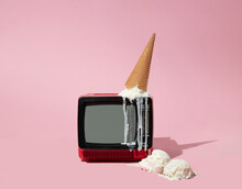 Creative Composition With Old Tv And Ice Cream Cone Up Side Down Melting And Two Vanilla Ice Cream Scoops On Pastel Pink Background. Retro Style Aesthetic Idea. Vintage Television Summer Concept.