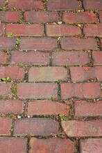 Vintage Red Brick Road Paved With Old Bricks.