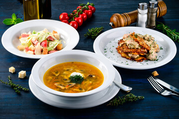 Poster - Top view of a three course set menu served on wooden table