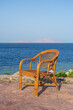 Rattan chair on the tropical beach near the sea in Sharm El Sheikh, Egypt