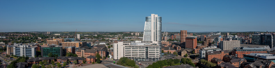 Wall Mural - Aerial view of Leeds city centre panoramic, modern buildings and architecture, offices, apartments and retail space in Northern England looking towards Bridgewater place, Train station and wharf