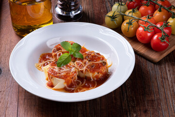 .Rondelli, a traditional pasta dish from Italian cuisine. With tomato sauce and parmesan cheese