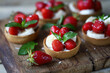 Delicious tartlets with strawberries and banana. Healthy summer dessert. Strawberry dessert.