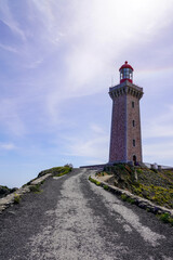 Wall Mural - Lighthouse access of Cap Bear on coast shores of the Mediterranean Sea in Port-Vendres France