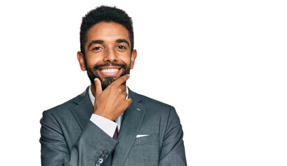 Poster - Young african american man wearing business clothes looking confident at the camera smiling with crossed arms and hand raised on chin. thinking positive.