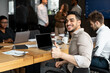 © Prostock-studio - Arab businesman sitting at desk showing thumbs up gesture