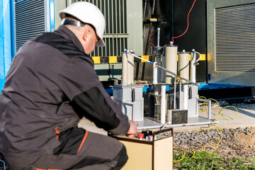 Wall Mural - execution of electrical measuring works on the power transformer