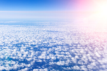 Wall Mural - View of a cloud with a blue sky from the window. With space to copy text