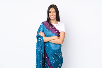 Wall Mural - Young Indian woman isolated on white background keeping the arms crossed in frontal position