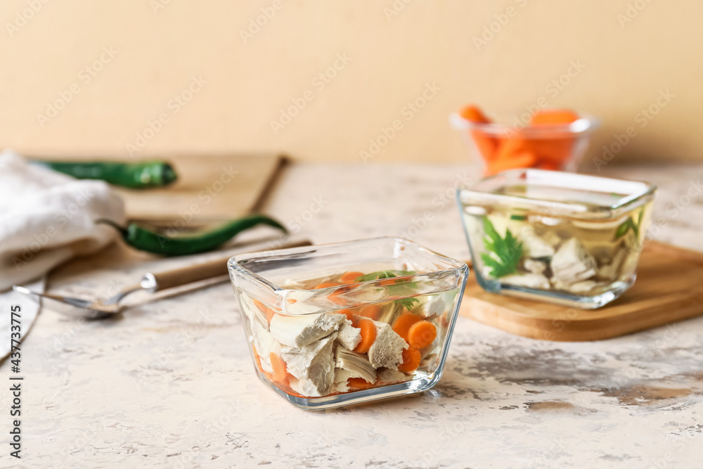 Bowl of tasty aspic on table