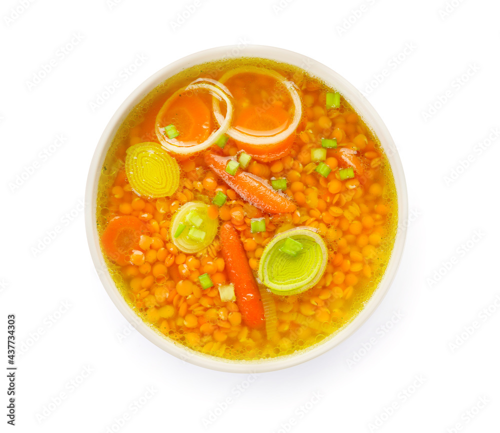 Bowl of tasty lentil soup on white background