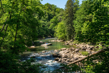 Visitors and families swim in the river at the Audra State Park near Buckhannon in West Virginia