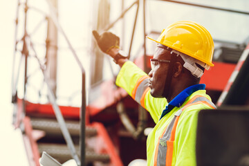 Black African port shipping staff director working in logistic control loading containers at ship cargo for import export goods foreman feel exhausted tired boring