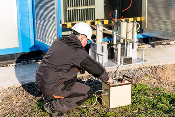 Wall Mural - execution of electrical measuring works on the power transformer