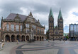 view of the historic market square in the old city center of Bremen with the city hall building and the cathedral