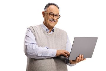 Sticker - Cheerful mature man holding a laptop computer and looking at camera