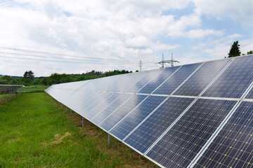 Solar Power Station on the spring Meadow 