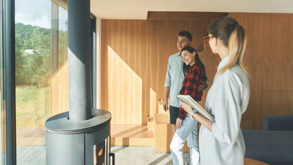 Happy family couple looking new home and getting ready to buy a property 