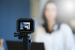 © itchaznong - Business woman or blogger recording vlog on digital camera and live stream.