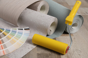 Sticker - Wall paper rolls, color palette and tool on wooden floor