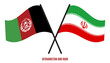 Afghanistan and Iran Flags Crossed And Waving Flat Style. Official Proportion. Correct Colors.