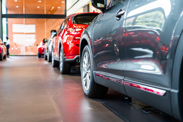 blur view of new modern car in showroom