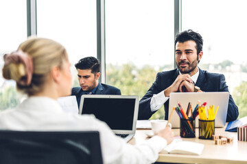 Group of professional business meeting and discussing strategy with new startup project.Creative business people planning and brainstorm with laptop computer in modern office.Teamwork concept