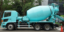 A Japanese Concrete Mixer Truck Parked On The Street