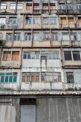 Wall Mural - Exterior of abandoned residential building in Hong Kong city