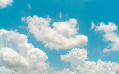 Wall Mural - white fluffy clouds on blue sky. soft touch feeling like cotton. white puffy cloudscape. beauty in n