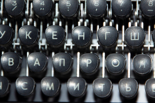 Black keyboard of an old Soviet typewriter