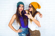 ©  AnnaHar - Close up fashion portrait of two young pretty hipster girls