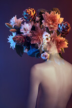 Beauty Flowers Face Of A Woman With Double Exposure. Portrait Of A Girl Neon Light And Color, Professional Makeup, Nude Back Of A Woman, Flowers In The Head
