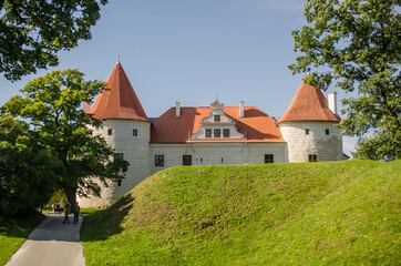 Wall Mural - Bauska city castle in Latvia up in the hill. Sunny autumn day.