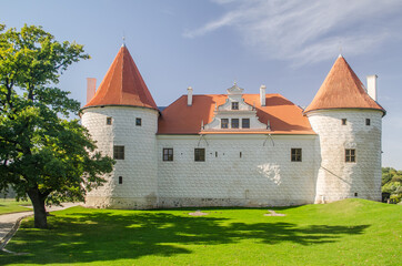 Wall Mural - Bauska city castle in Latvia up in the hill. Sunny autumn day.