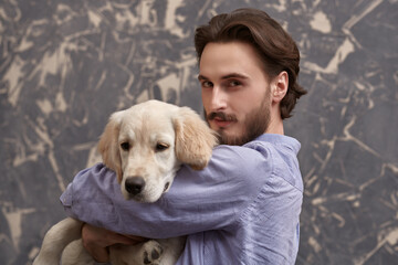 Poster - lovely puppy and a man