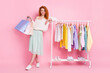 © deagreez - Full body photo of young girl happy positive smile shop buy clothes bags sale isolated over pink color background